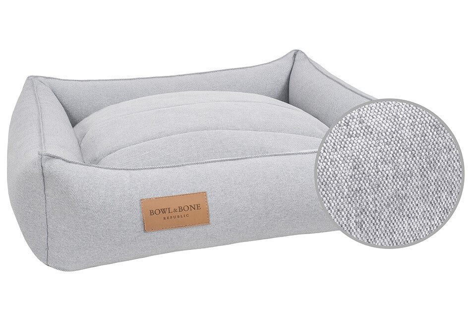 Hundebett aus grauem Stoff